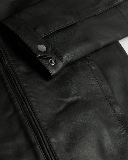 PAYPA-Outerwear-Perfect for weekends or evenings out, the PAYPA jacket is sure to become a permanent fixture in any gent's wardrobe. Crafted in luxurious leather and fully lined with branded Ts, the button collar on the neck lends a unique finish to the style. Leather Zip fastening Internal pocket Quilted detail on shoulders Fully lined Side pockets Button detail on neck and sleeve Our model is 6'2" 1.87m and wears a Ted size 3- Ted Baker Romania